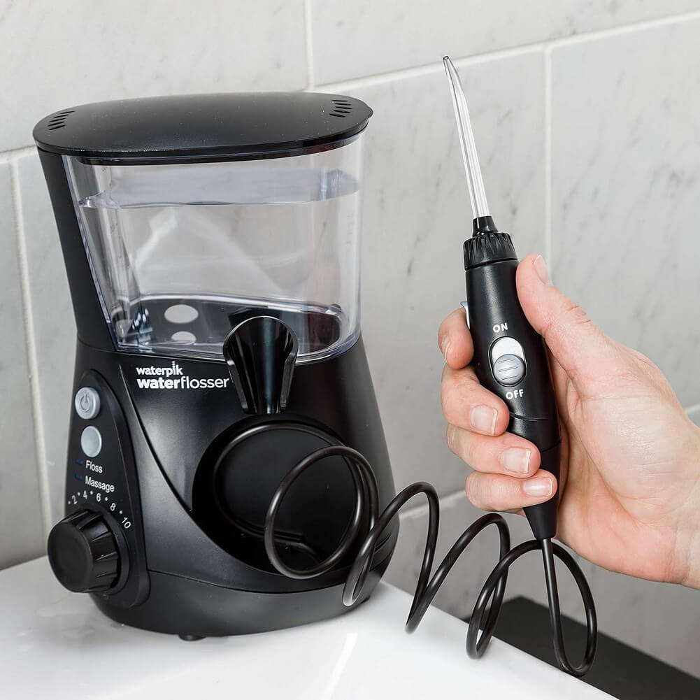 Waterpik Ultra Professional Water Flosser, Dental Plaque Removal Tool with 7 Tips, Advanced Pressure Control System, 10 Pressure Settings, 90s of Water Capacity - Imported from UK
