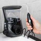 Waterpik Ultra Professional Water Flosser, Dental Plaque Removal Tool with 7 Tips, Advanced Pressure Control System, 10 Pressure Settings, 90s of Water Capacity - Imported from UK