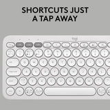 The keyboard features round keys, a slim design, and visible Logitech branding