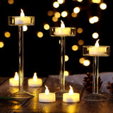 AGPTEK Flickering LED Tealights, Battery Operated Flameless Candles for Wedding, Holiday Party, Home Decor (24 Warm White Candles) - Imported from UK