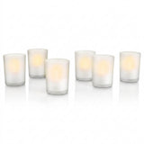 Six frosted glass tea light candles with warm yellow LED lights
