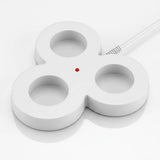 White three-loop charging base of LED candles