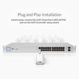 UniFi networking switch setup showing a silver 24-port PoE switch 