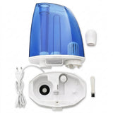 Disassembled Humidifier with its power cord, small accessory piece, and brush