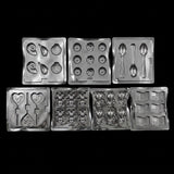 A set of seven plastic chocolate making molds 